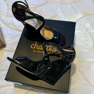 Jimmy Choo.  9.5 wedge